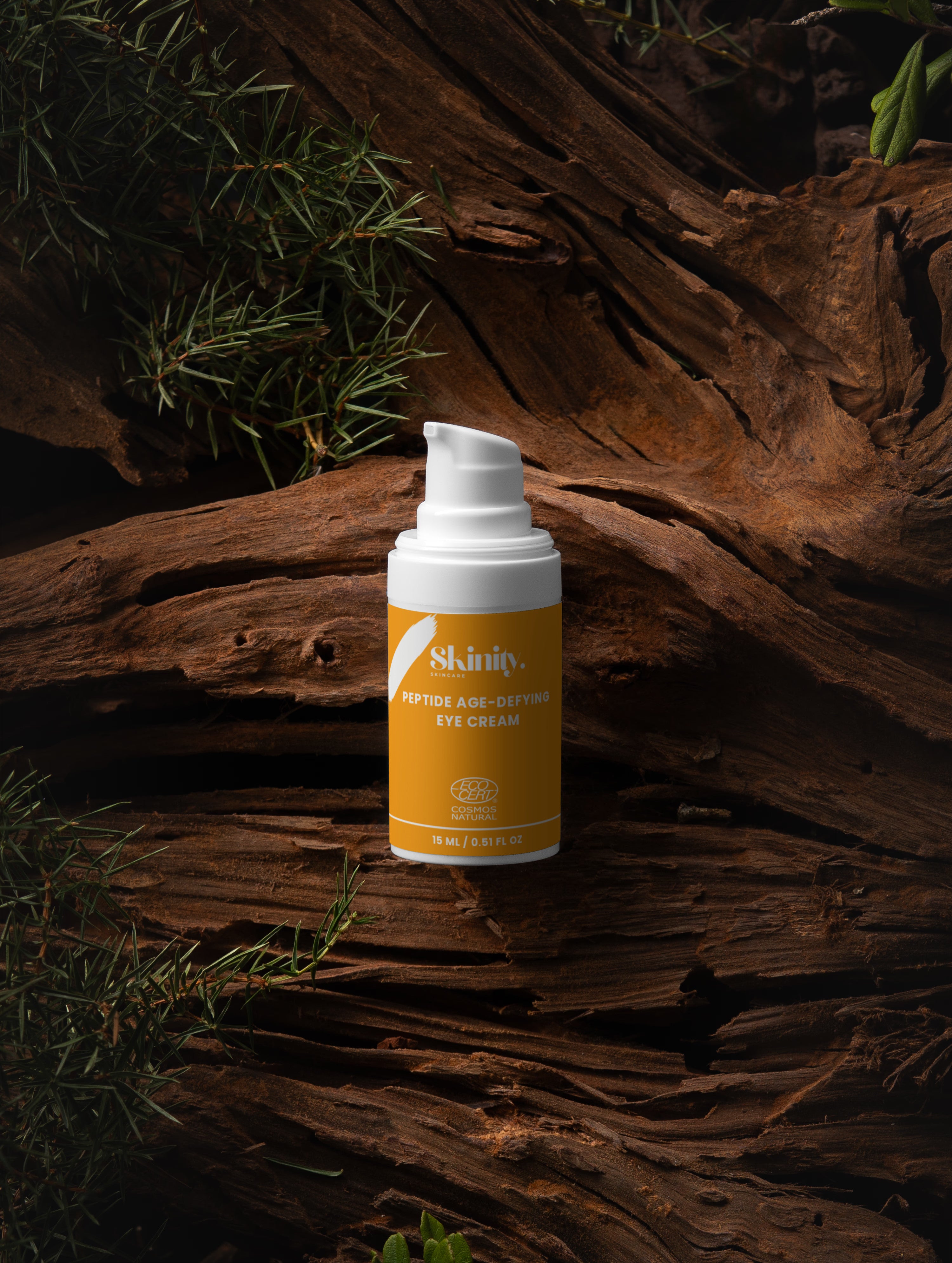 Skinity Skincare Peptide Anti Aging Eye Cream for Wrinkles and Dark Circles premium product bottle placed on an organic luxury dark wood texture background with natural greenery elements