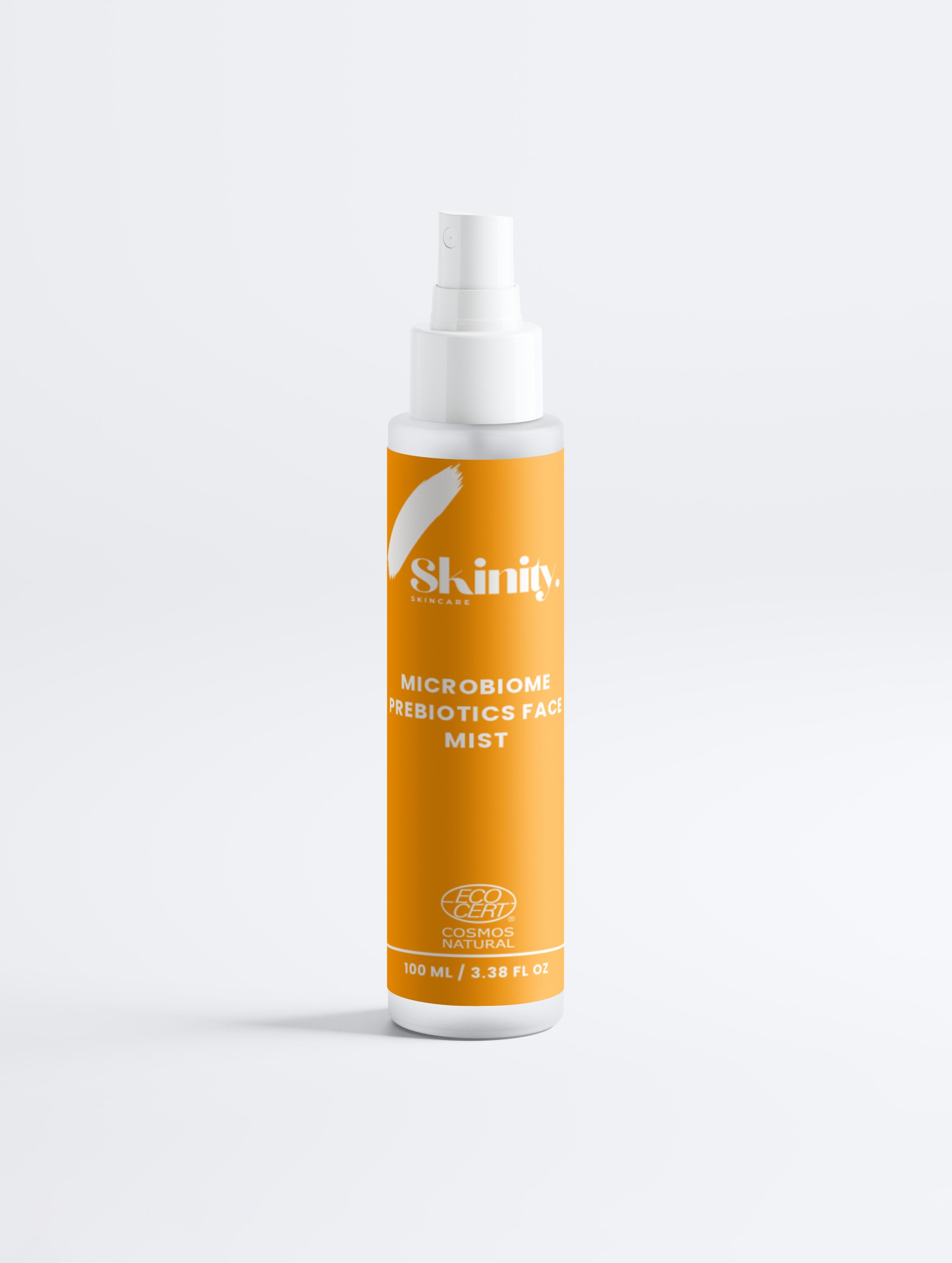 Microbiome Prebiotics Face Mist bottle with orange label for skin hydration and balance