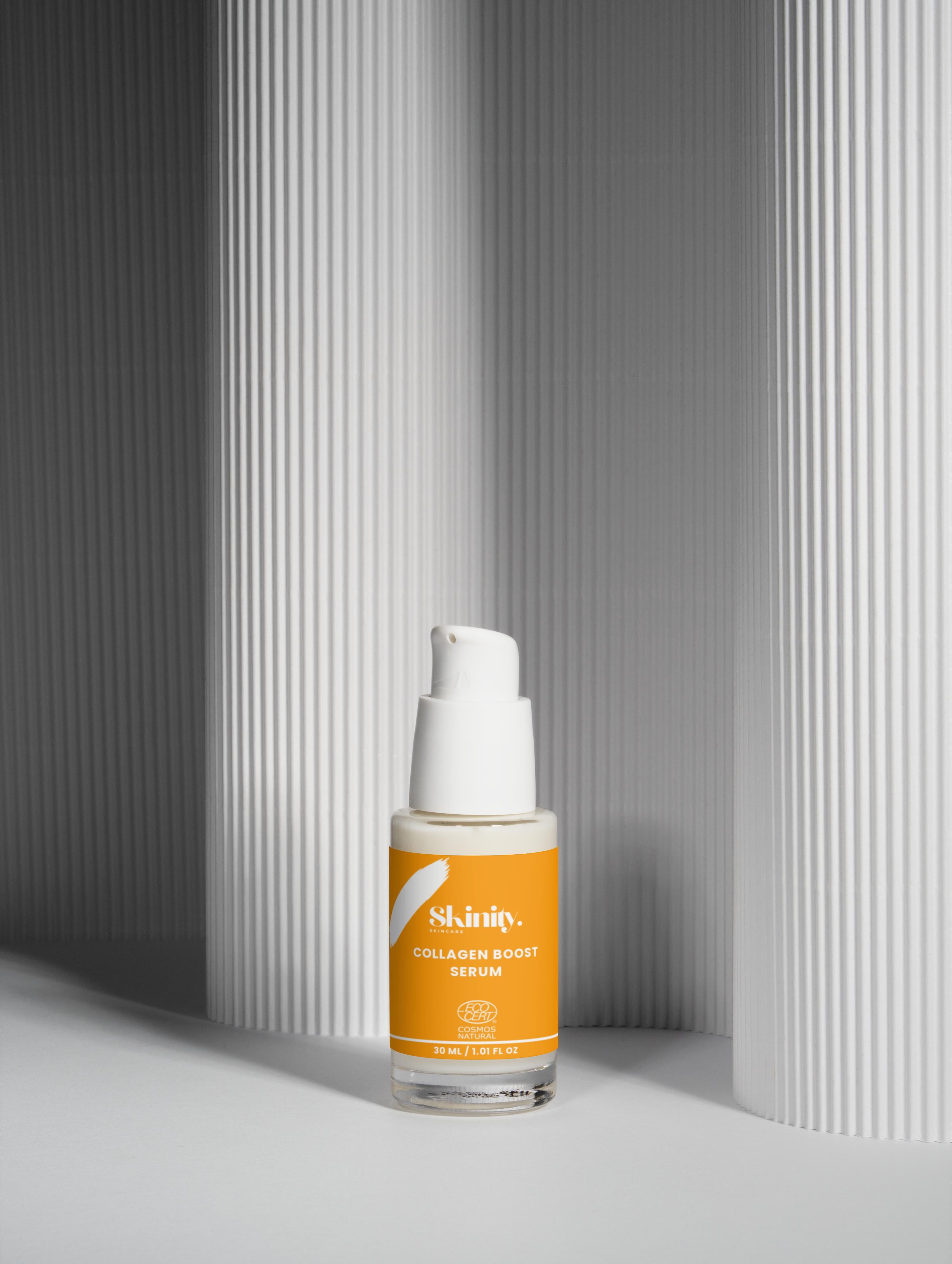 Collagen Boost Serum for All Skin displayed in an elegant setting, promoting smoothness and hydration.