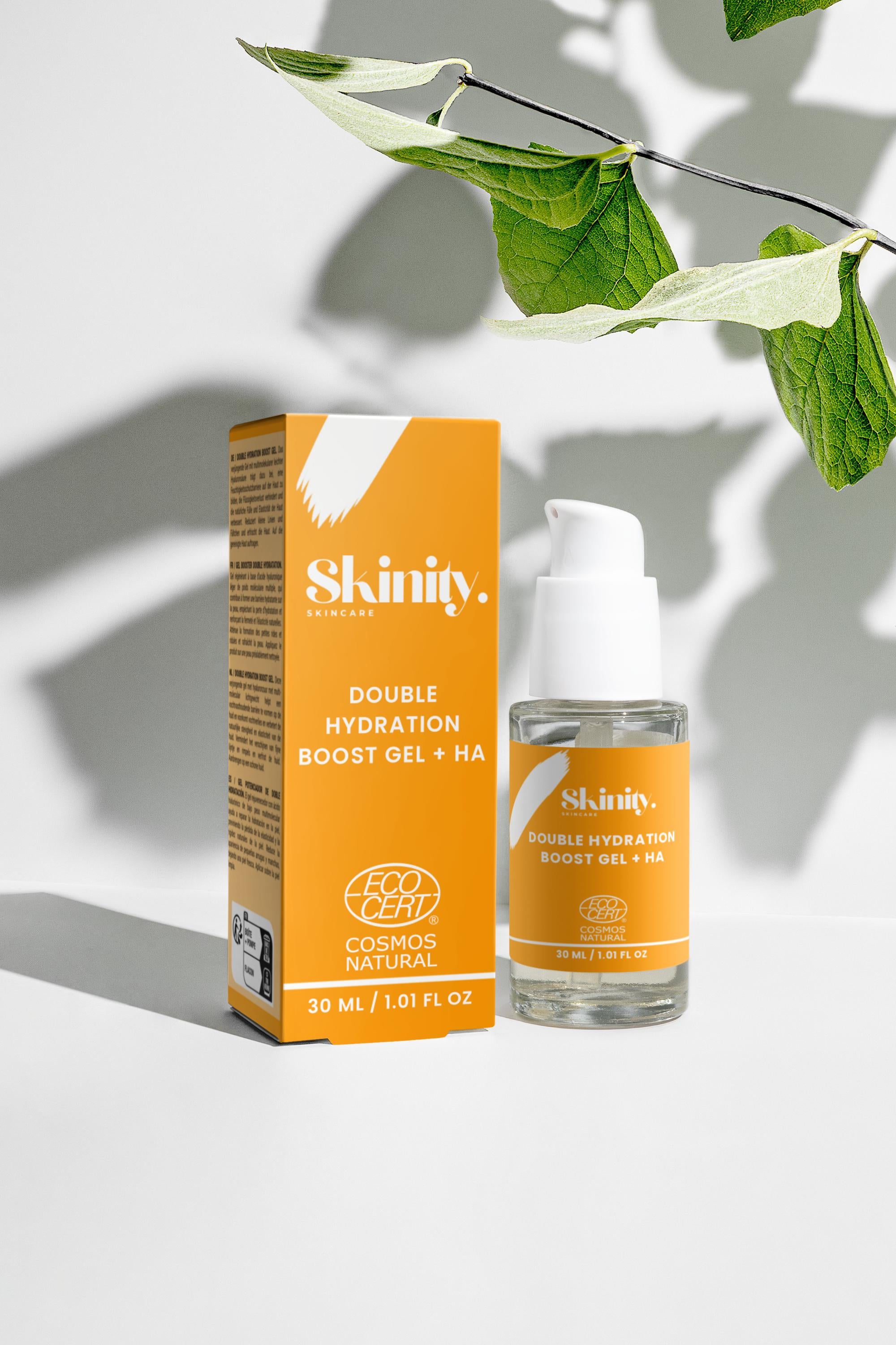 Skinity Double Hydration Boost Gel + HA in a clear bottle with eco-friendly packaging and natural leaves backdrop.
