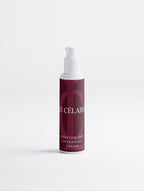 A bottle of Célaires Blemish Care Moisturiser with a white pump dispenser and a deep burgundy label, set against a clean white background.