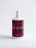 A bottle of Le Célaire Sensitive Skin Face & Body Cleanser with a white pump dispenser and a deep burgundy label, set against a clean white background.