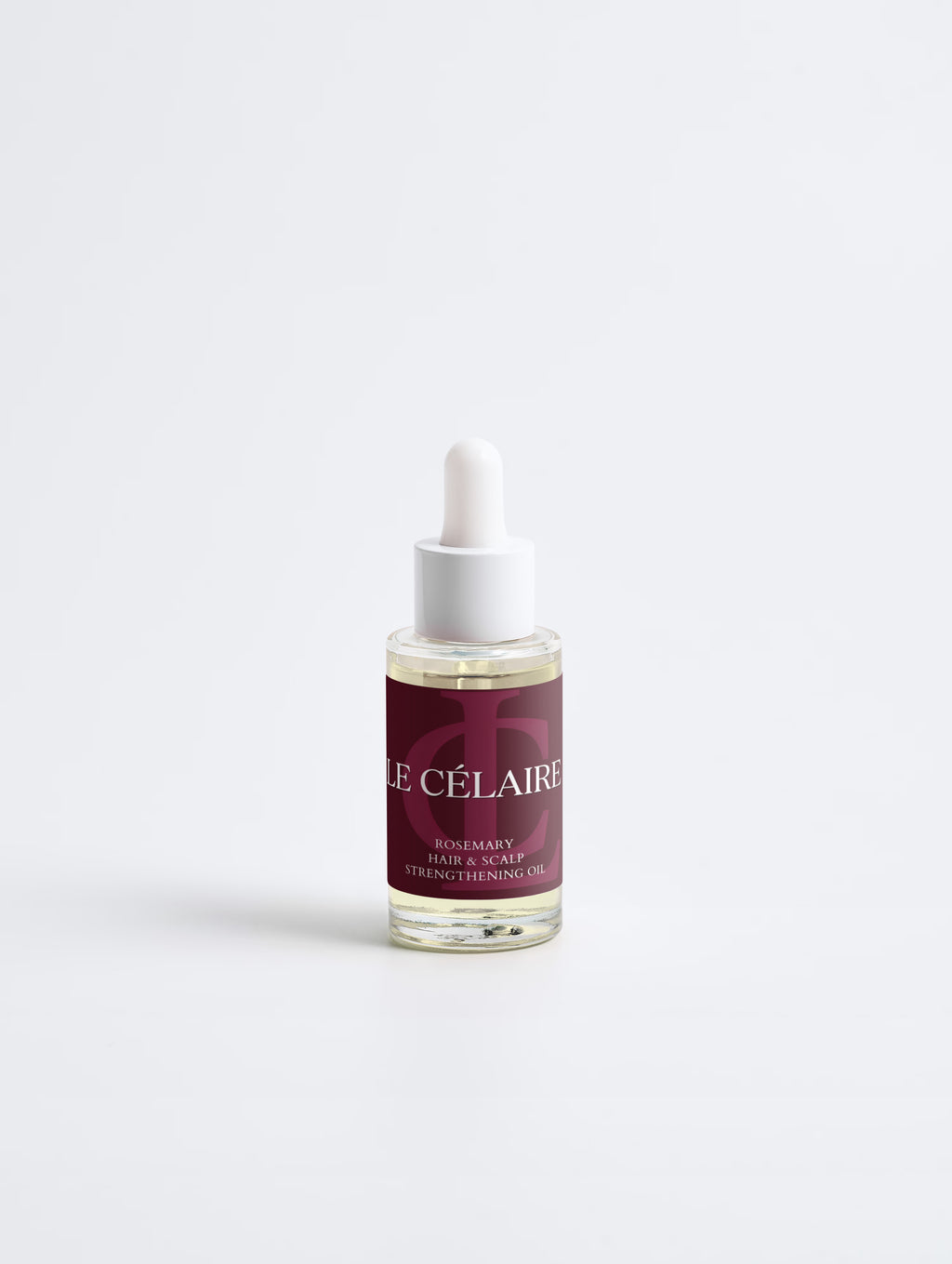 A small glass dropper bottle of Le Célérie Rosemary Deep Pore Treatment Eye Strengthening Oil, featuring a deep burgundy label and a white dropper cap, set against a clean white background.