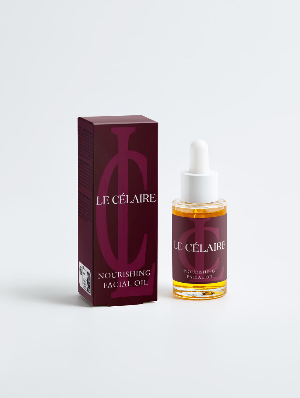 Avea Natural Retinol Alternative Oil Serum shown with its black product box and clear glass dropper bottle containing yellow oil, on a light gray background.
