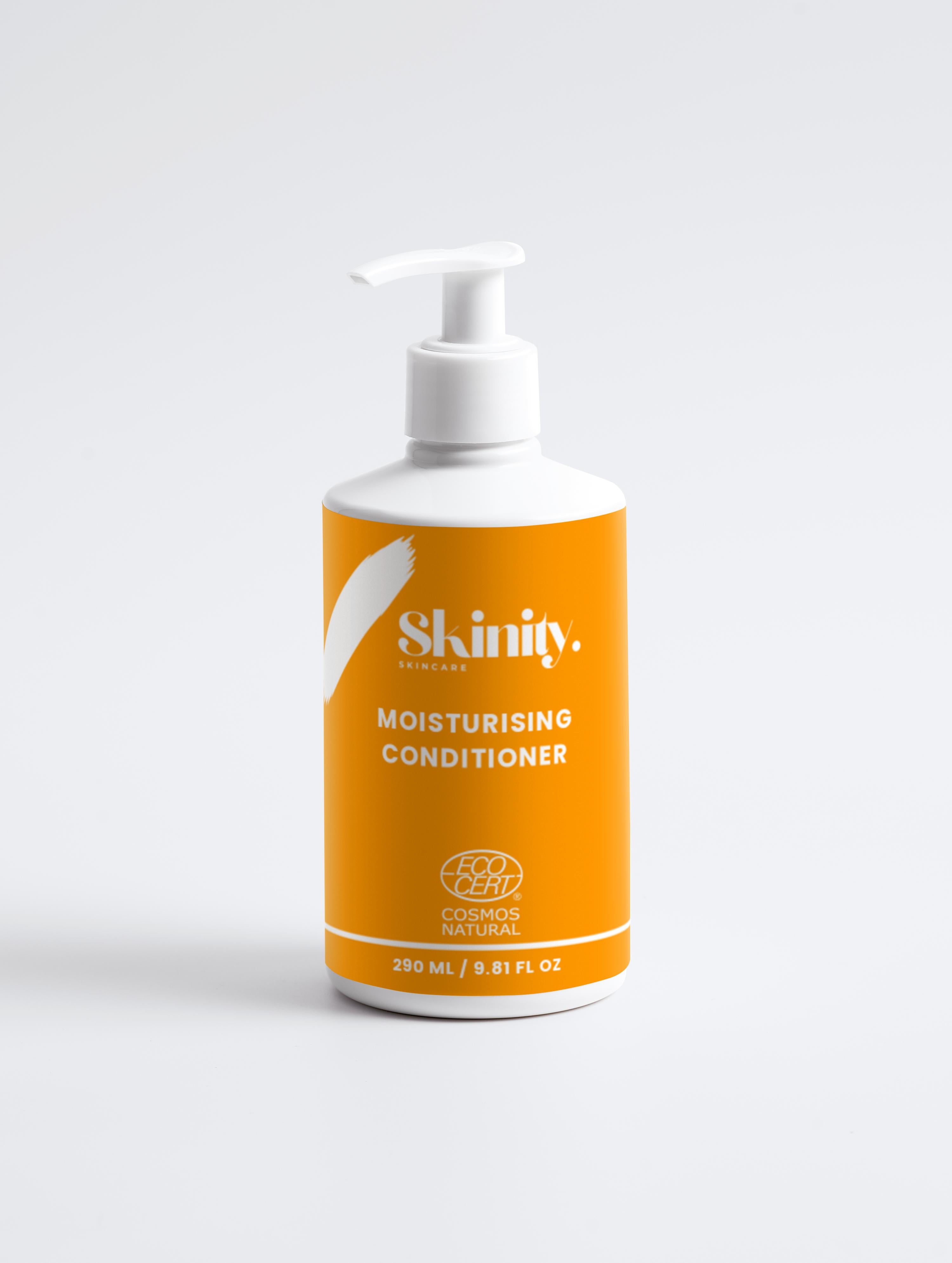 Moisturising Conditioner for all Hair Types bottle with pump in bright orange packaging.
