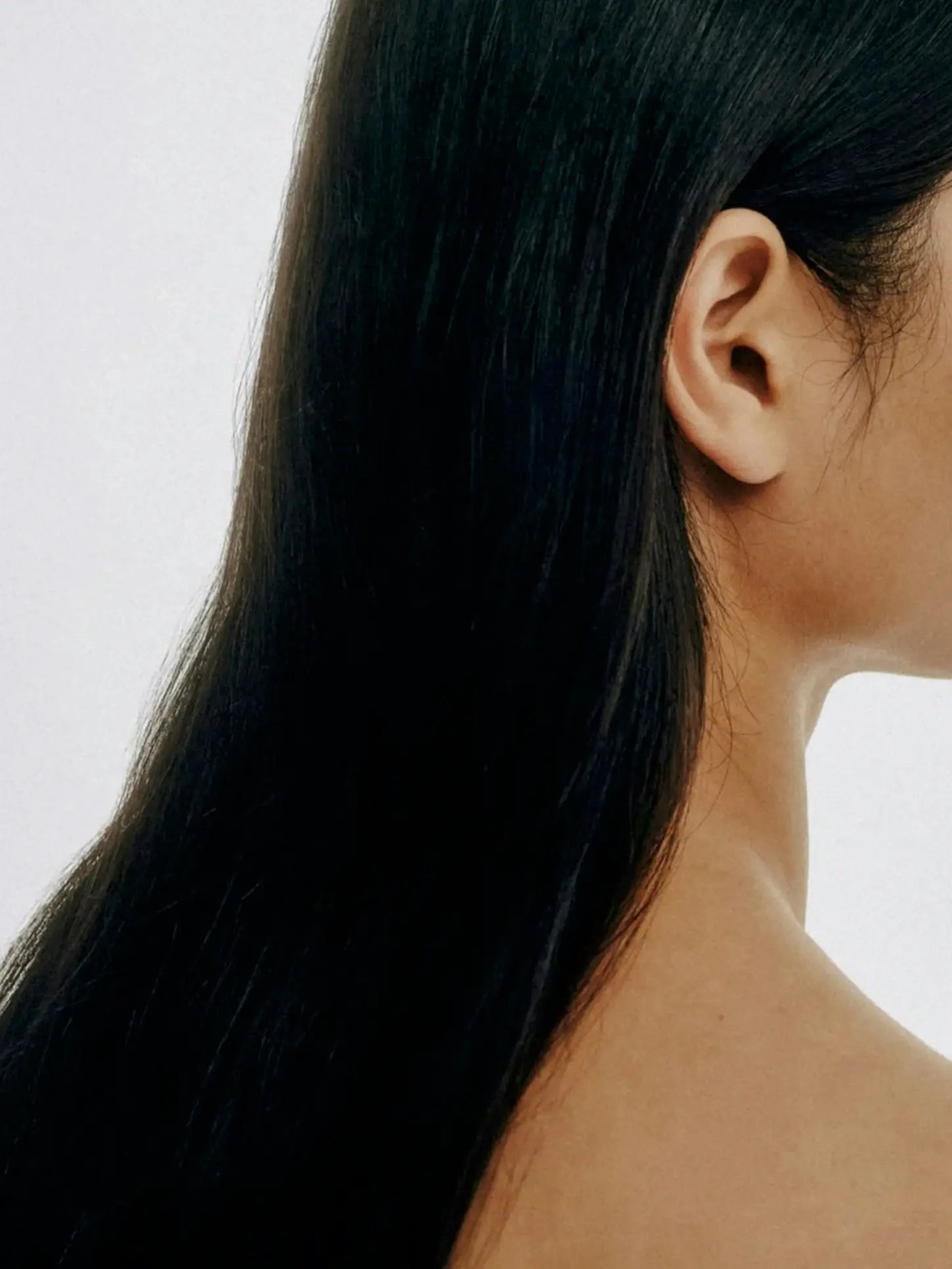 Keratin Shine Leave In Hair Mist, showcasing smooth and silky textures, perfect for revitalizing damaged hair.