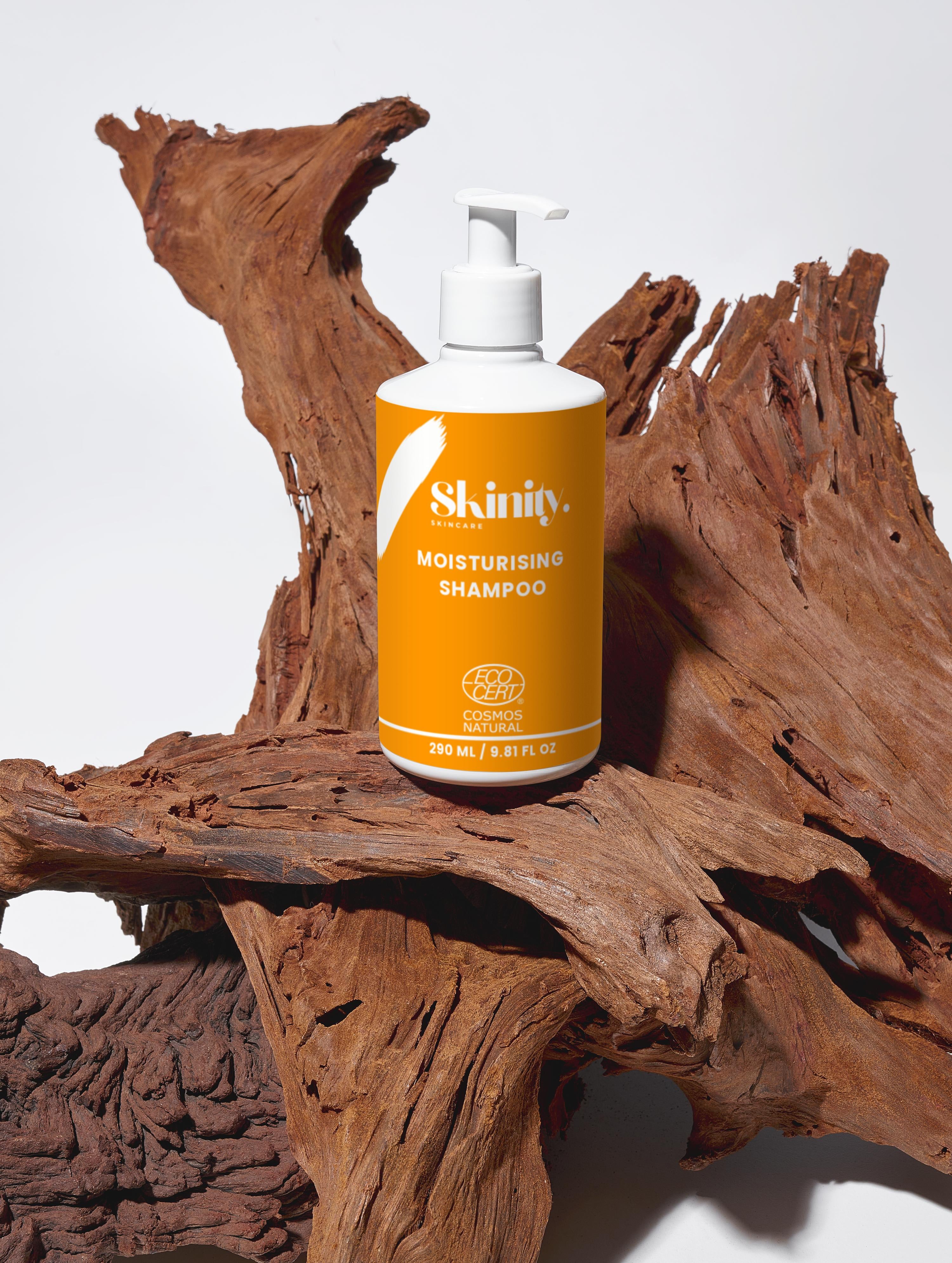 Moisturising Shampoo for all Hair types in a bottle displayed on rustic wood.