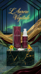 Le Célébrity Retinol Alternative Serum and its matching box displayed on a dark green marble pedestal, surrounded by gold and burgundy draped fabric, yellow flowers, and a reflective water surface. The background features a dark window frame with the green aurora borealis and gold cursive text reading 'L'Aurore Végétale'.