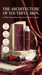Le Célère Anti-Age Day Cream shown with its matching box and pump bottle on a styled marble pedestal with cream, berries, and draped burgundy fabric. Large text at the top reads 'THE ARCHITECTURE OF YOUTHFUL SKIN.