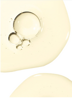 Rosemary Hair and Scalp Strengthening Oil texture shown in a smooth golden liquid with bubbles.