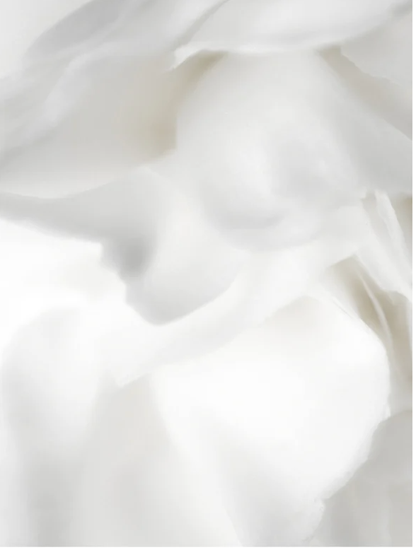 Keratin Shine Leave In Hair Mist, showcasing smooth and silky textures, perfect for revitalizing damaged hair.