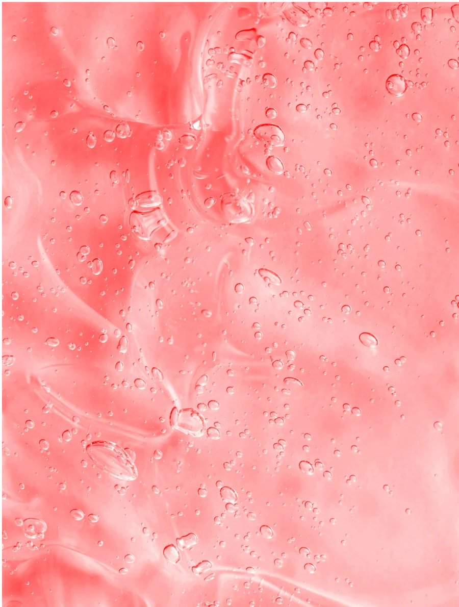 Radiant Glow Facial Wash For All Skin Types with a vibrant light pink gel texture and refreshing bubbles.