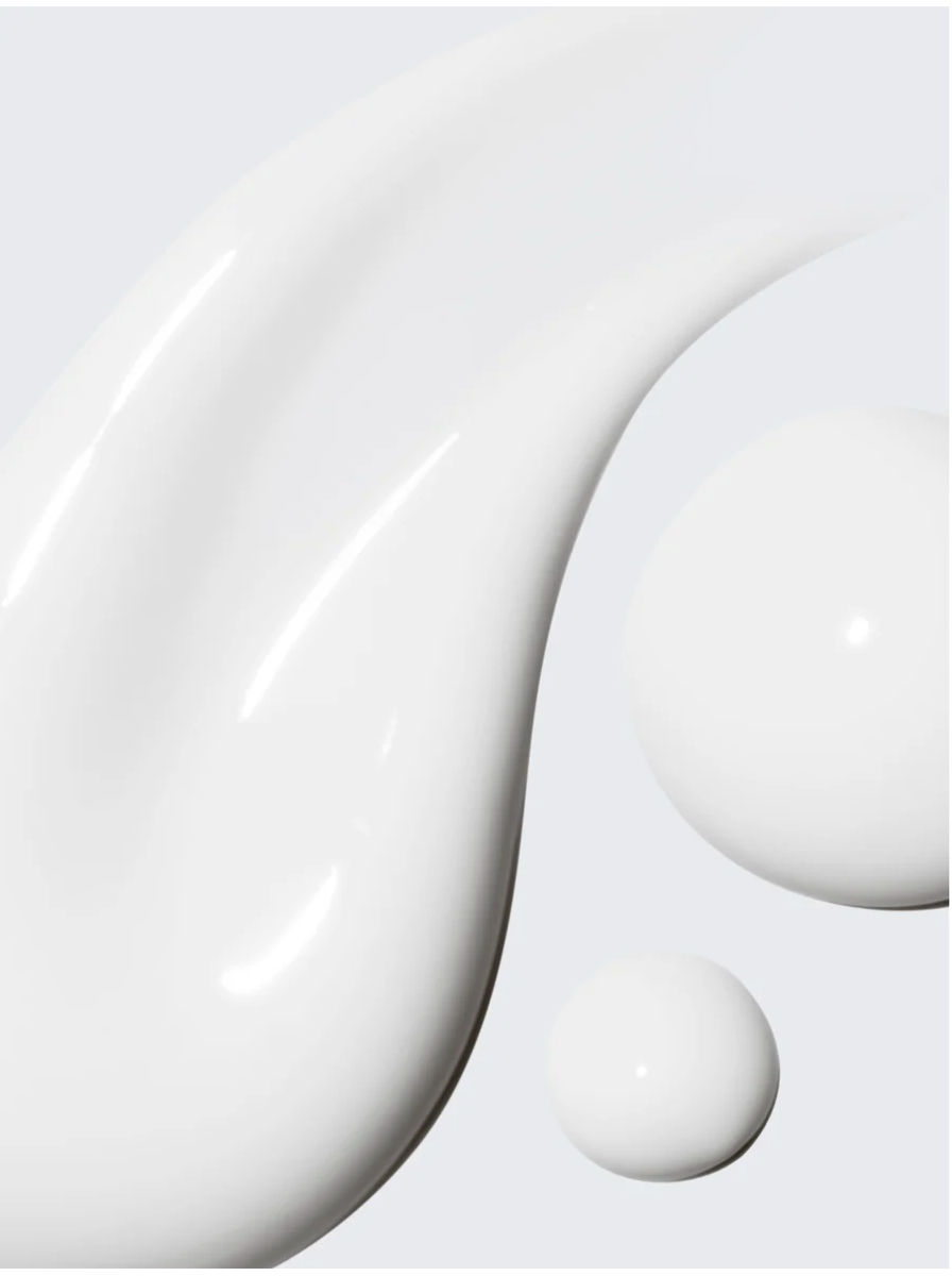 White cream texture and droplets representing Sensitive Skin Overnight Cream Fragrance Free for soothing and refreshing skin.