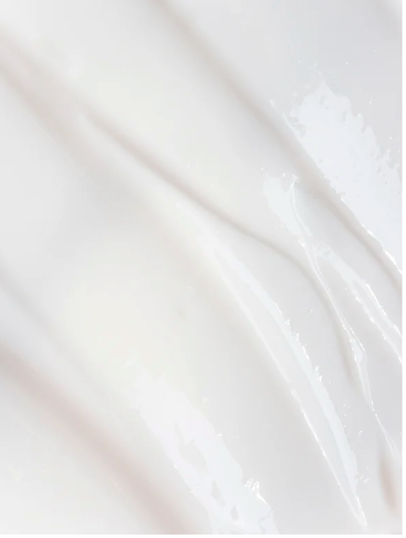 Close-up view of a smooth, creamy texture of Sensitive Skin Overnight Cream Fragrance Free.