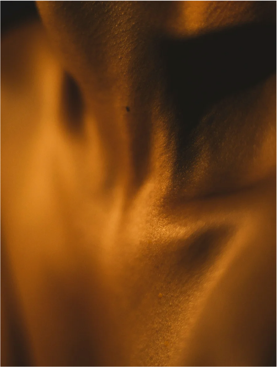 Close-up of smooth, glowing skin showcasing texture, ideal for promoting Omega 6-9 Glowing Skin Body Oil For All Skin Types.