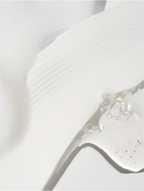 Sensitive Skin Face and Body Cleanser showcases a gentle, foamy texture for delicate skin types.