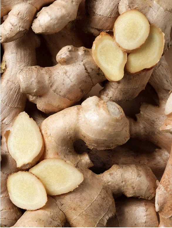 Close-up of fresh ginger root slices used as a natural antioxidant ingredient in Skinity Blemish Care Moisturiser.