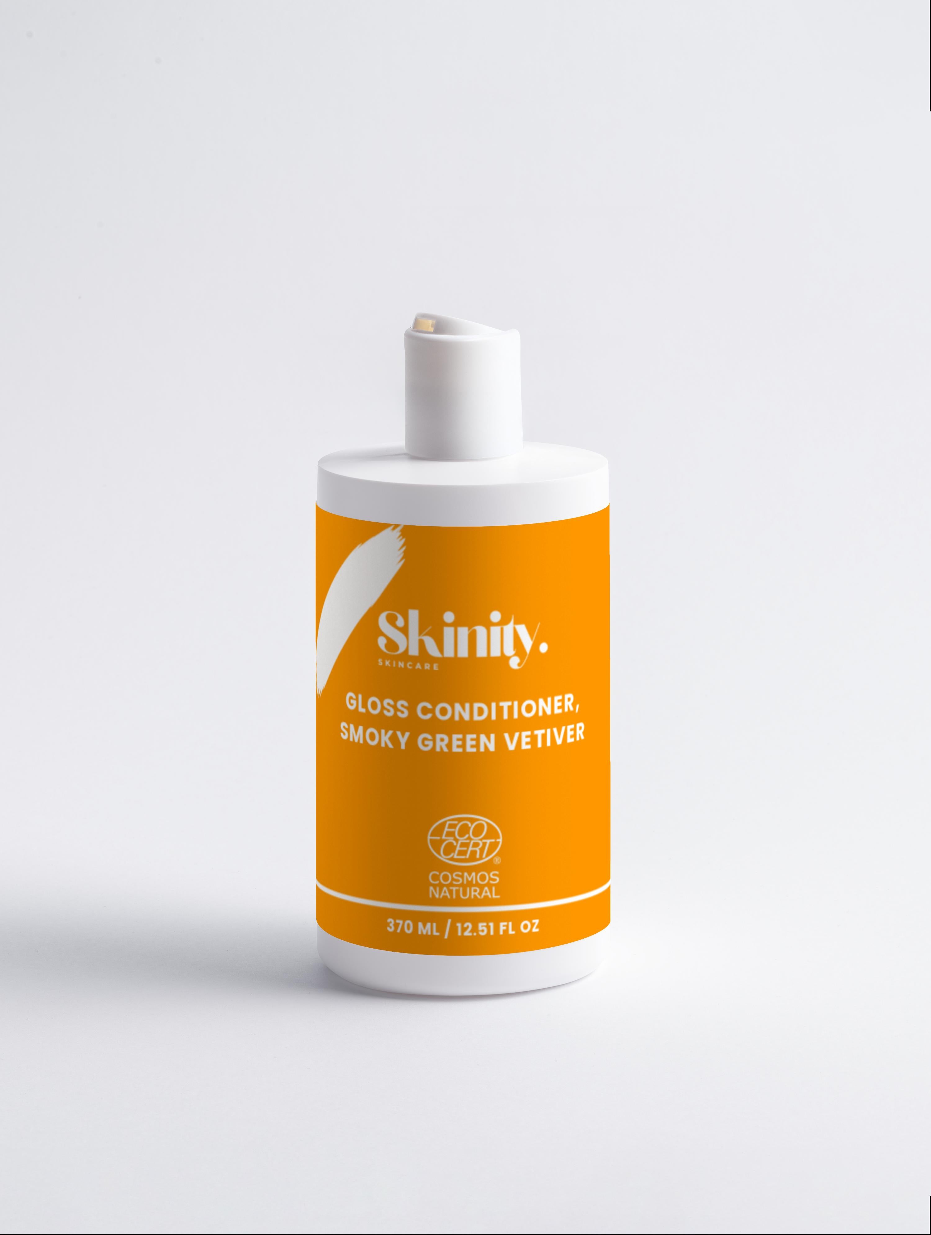 Gloss Conditioner Smoky Green Vetiver bottle on a white background for smooth, nourished hair.
