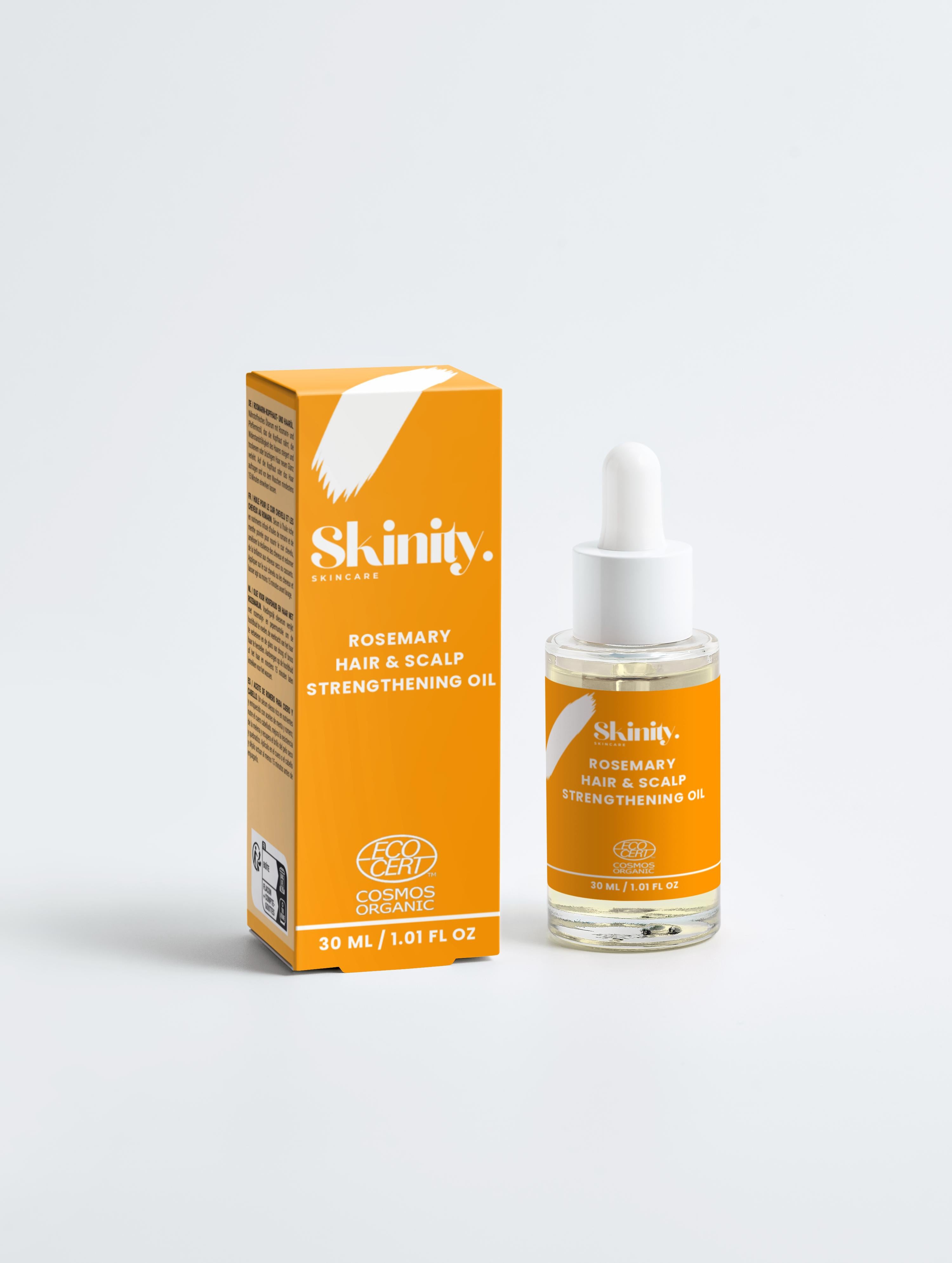 Rosemary Hair and Scalp Strengthening Oil bottle and box displayed together on a light background