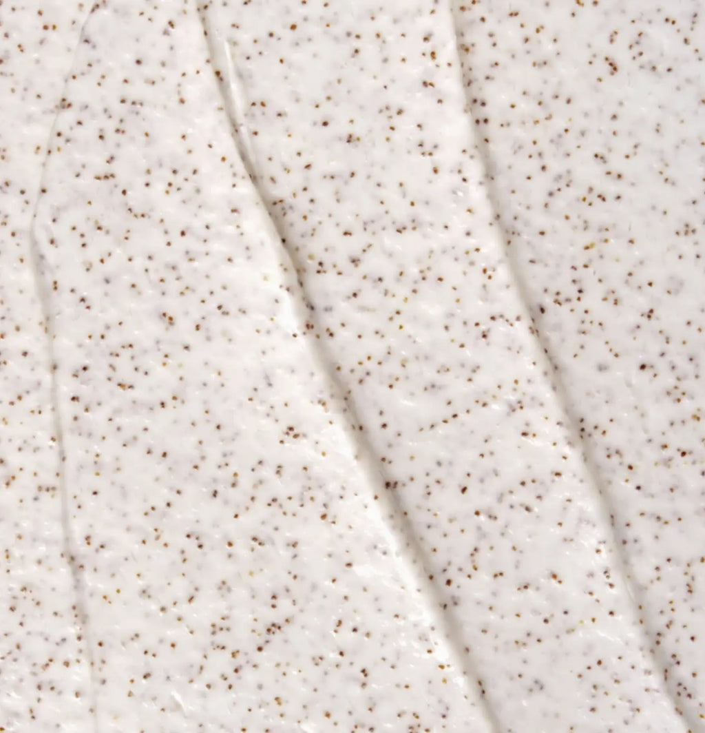 Le Célaire Deep Cleanse Scalp Scrub creamy white texture swatch with fine crushed sour cherry shell particles