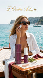 Ultra-realistic 9:16 commercial lifestyle photograph for Le Célaire Sun Protection SPF 50 Stick, showing the open stick and burgundy box on a luxury yacht teak table, an elegant woman applying tinted sunscreen under Riviera sun, diamonds, and liquid gold calligraphy.