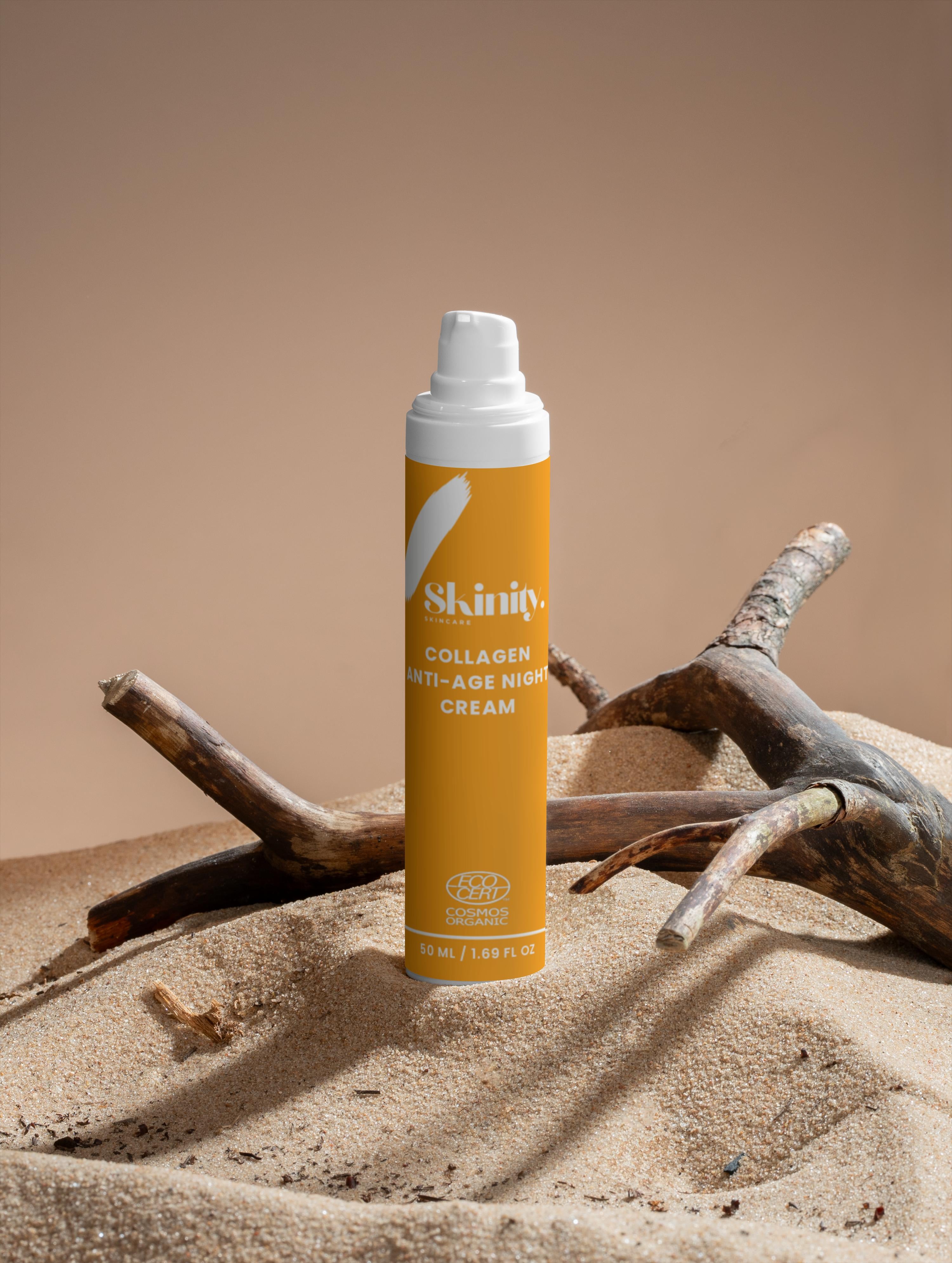 Skinity Collagen Anti-Age Night Cream for all Skin in a stylish bottle on sandy background.