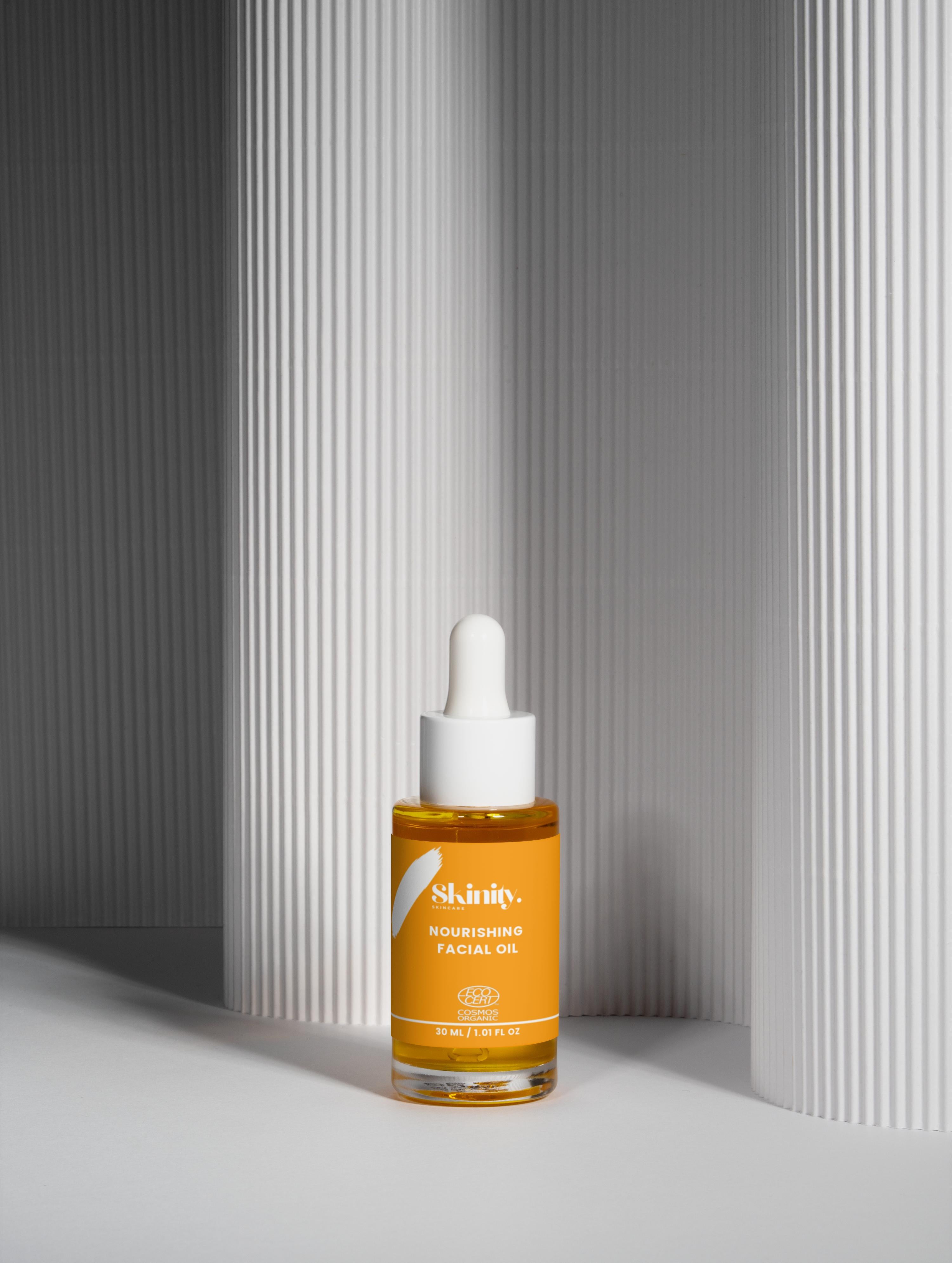 Nourishing Facial Oil For All Skin in dropper bottle showcasing its glow and hydration benefits.