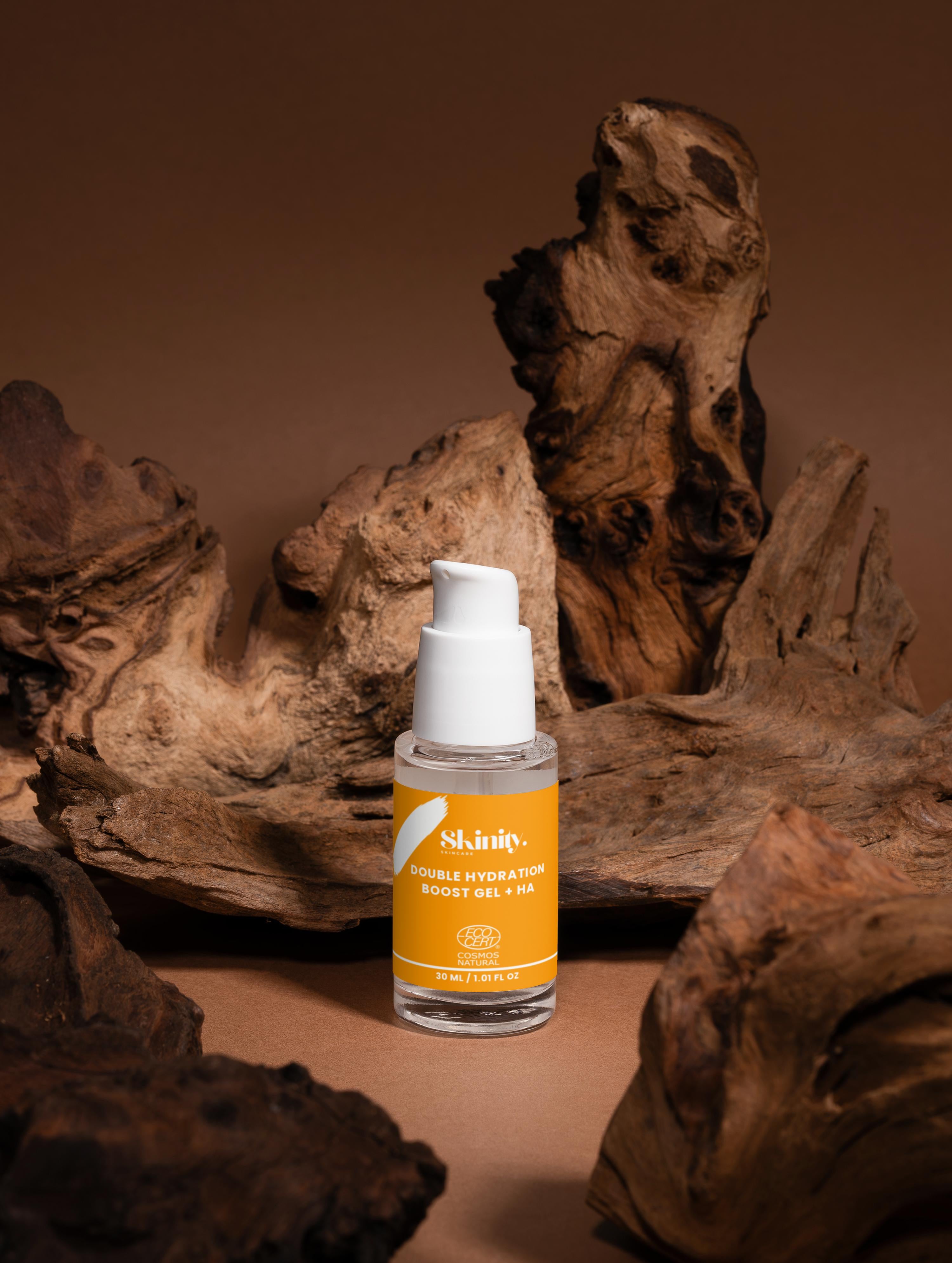 Double Hydration Boost Gel + HA product on textured wooden background.